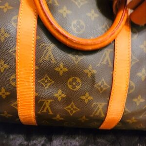 Authentic Louis vuitton travel bag  50 lock and key, laugage tag